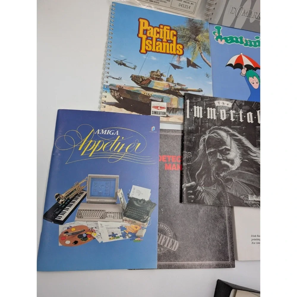 Commodore 64 Amiga Manuals Lot Immortal Lemmings Triple X Plus More